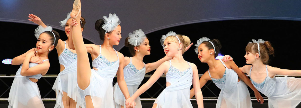 Kids dancers in blue dresses